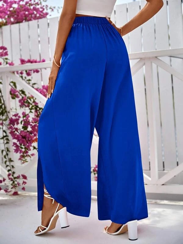 Pantaloni a gamba larga monocolore incrociati