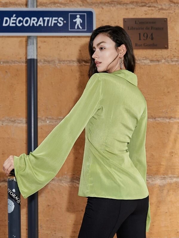 Camicia monocolore manica svasata