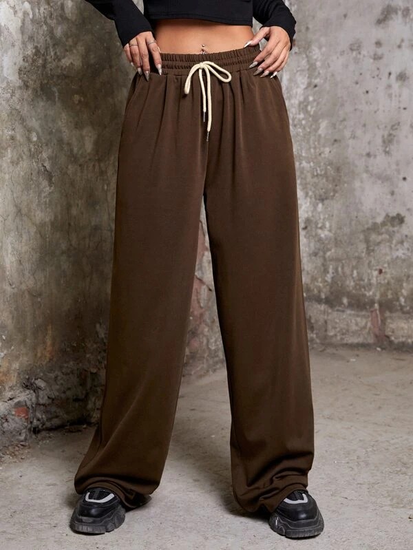 Pantaloni con grafica lettera e tasca inclinata