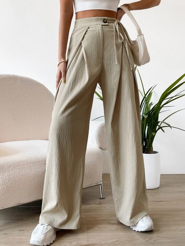 Pantaloni a gamba larga con vita alta e dettaglio plissettato