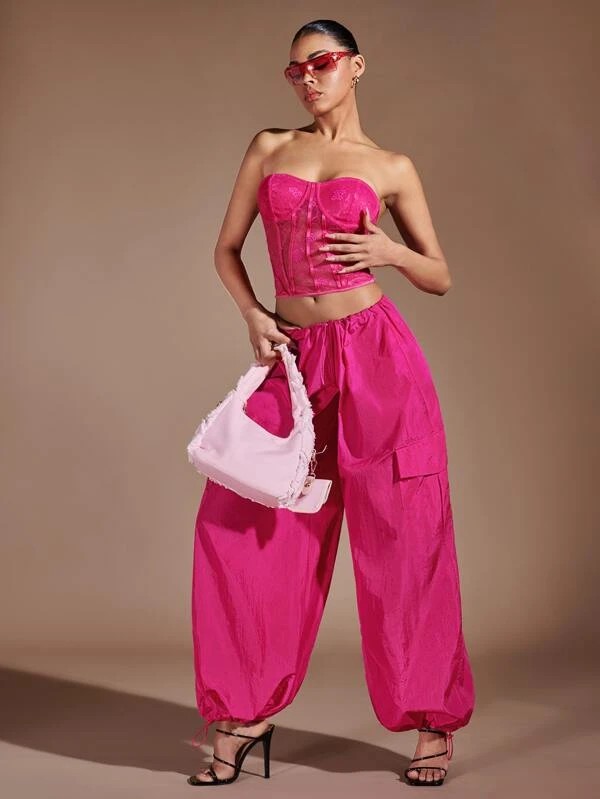 Pantaloni cargo con tasca laterale e patta