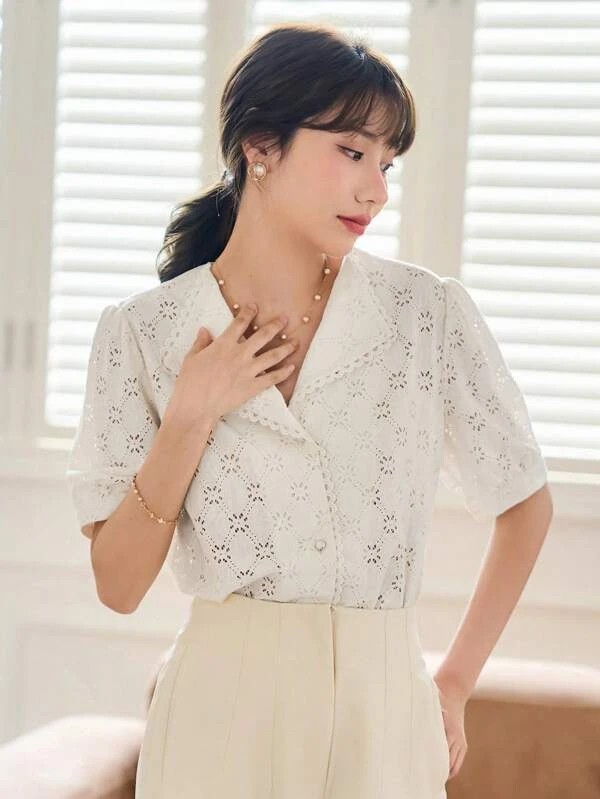 Camicia ricamo occhielli bottone frontale