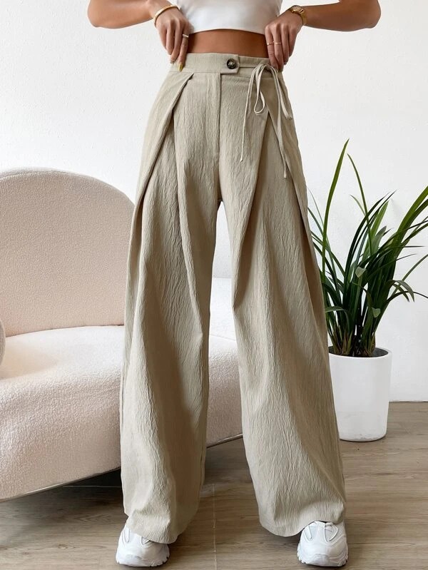 Pantaloni a gamba larga con vita alta e dettaglio plissettato