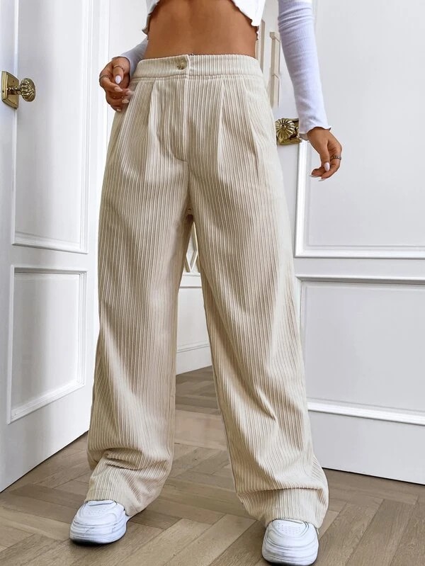 Pantaloni a vita alta in velluto a coste con gamba larga e tasca inclinata