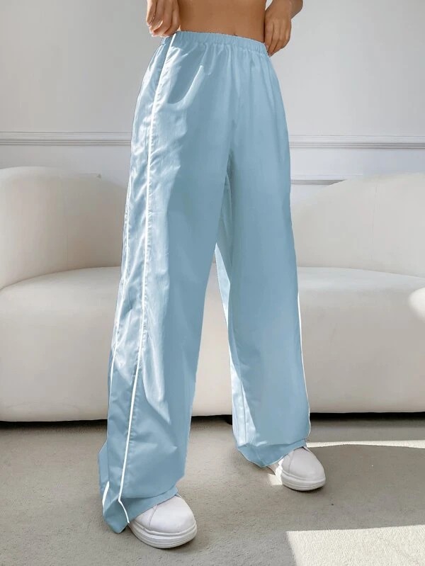 Pantaloni con bordo a contrasto e vita elastica