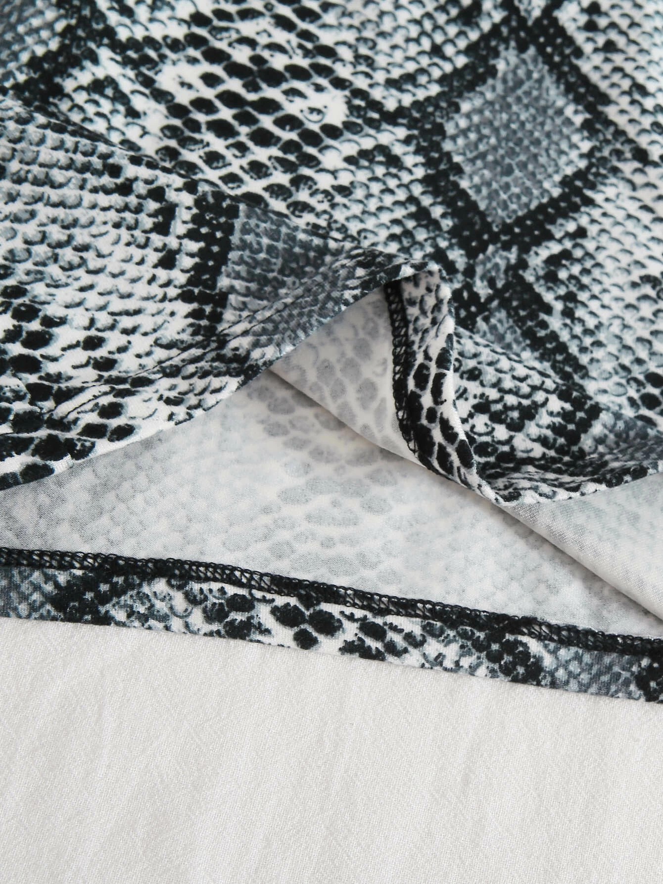 Canotta monospalla in mesh.