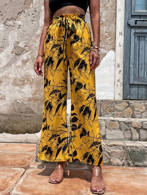 Pantaloni stampa piante con cintura.