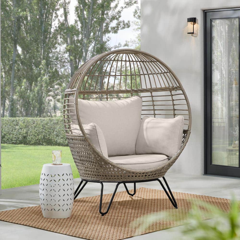 Hampton bay brown wicker round outdoor patio egg lounge chair swing deals with biscuit tan cushions