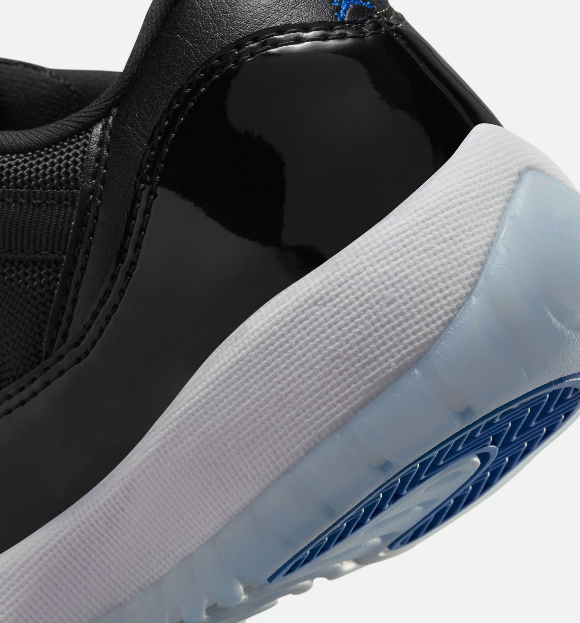 Air Jordan 11 Retro Low Black and Varsity Royal Grade School Lifestyle Shoe - Black/Varsity Royal/White