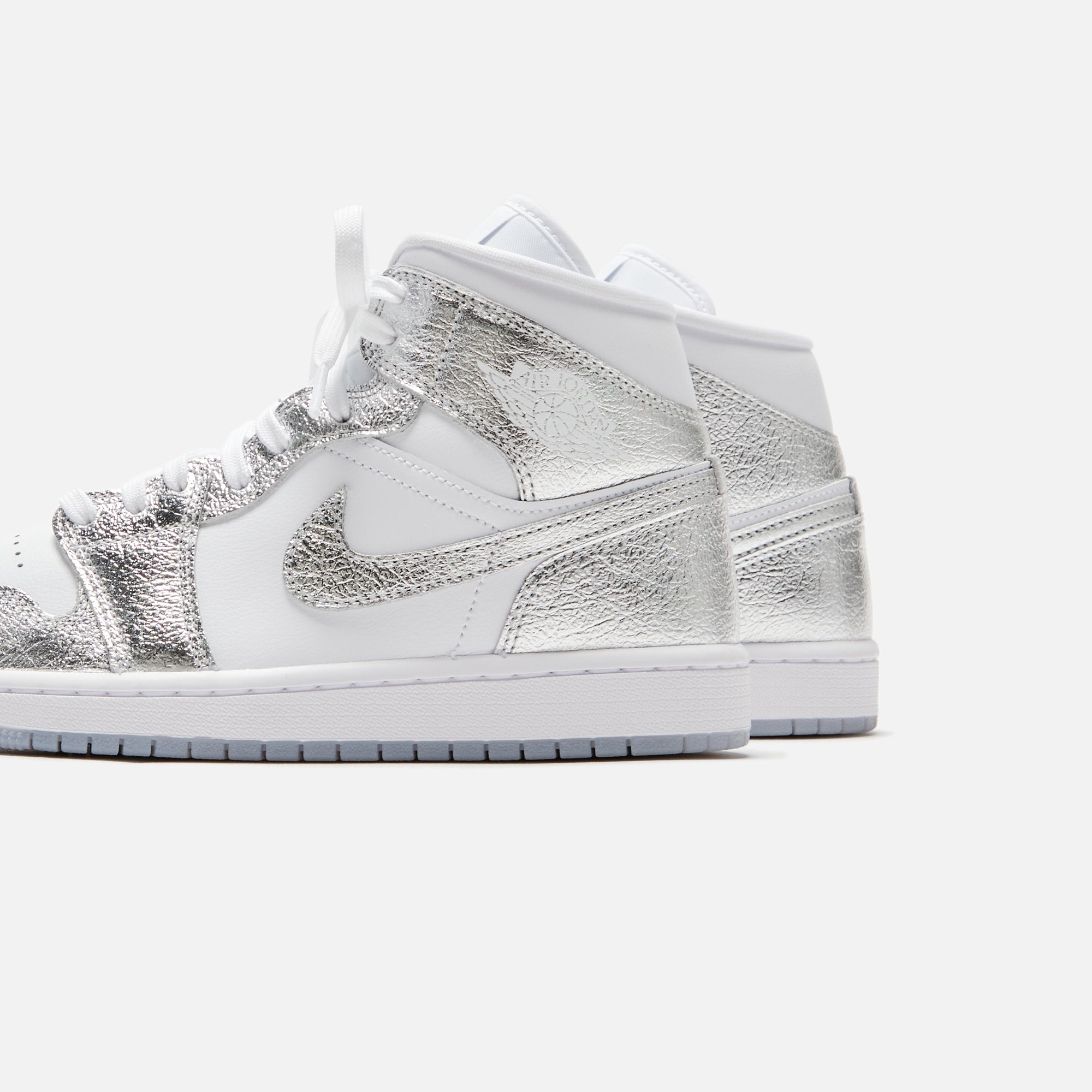 Nike WMNS Air Jordan 1 Mid SE - White / Metallic Silver